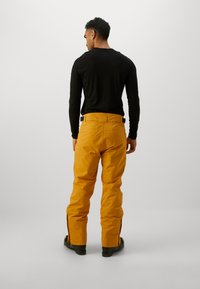 Icepeak COLMAN Pantaloni da sci rust/senape