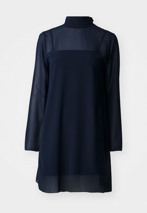 Vestido de manga larga azul marino con cuello alto, hecho de material transparente, que presenta una parte superior sólida y un dobladillo inferior fluido.