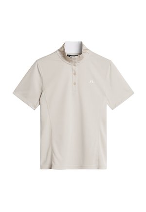 Polo shirt beige a maniche corte con tre bottoni, colletto alla coreana e piccolo logo bianco sul lato sinistro del petto.