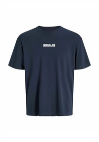 Marineblå bomulds t-shirt med rund hals. Har hvid "SEOUL" tekst og designelementer på forsiden. Korte ærmer, afslappet pasform.