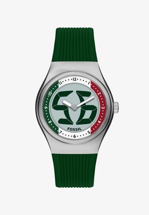 Watch with silver case, green silicone strap, dial showing green and red sections, large stylized green numbers, and silver hour and minute hands.
