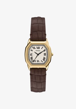 Montre fossile octogonale avec un boîtier doré, un cadran texturé blanc, des chiffres romains et un bracelet en cuir brun foncé embossé.