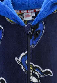 Navy blue fleece zip-up hoodie with a light blue lined hood. Features Marvel characters in a colorful pattern. Soft texture with a front zipper.
