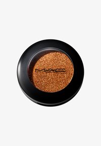 Fard à paupières MAC dans un compact rond noir. Présente une finition pailletée dorée et bronze réfléchissante. La texture semble lisse et brillante.