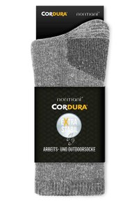 Graue Cordura-Socken mit geripptem Textil, verstärkt an Fersen- und Zehenbereich, verpackt mit einem schwarzen Etikett, das "extra stabil" hervorhebt.