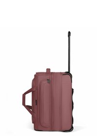Valigia morbida su ruote in rosa polveroso con manico telescopico, manici laterali, tasca con zip anteriore e ruote alla base.