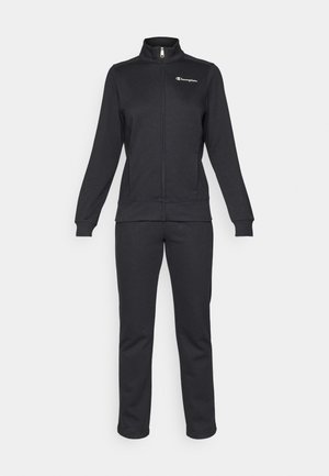 Čierny teplákový komplet vyrobený z bavlneného zmesi, obsahujúci zipsovú mikinu s stojatým golierom a nohavice s elastickým pásom. Obsahuje detail loga.