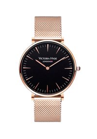 Reloj con dial negro, caja de oro rosa y pulsera de malla. Presenta marcadores de hora y manecillas delgadas, logotipo de la marca en el centro. Diseño minimalista.