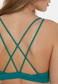 SQUATPROOF Top - teal