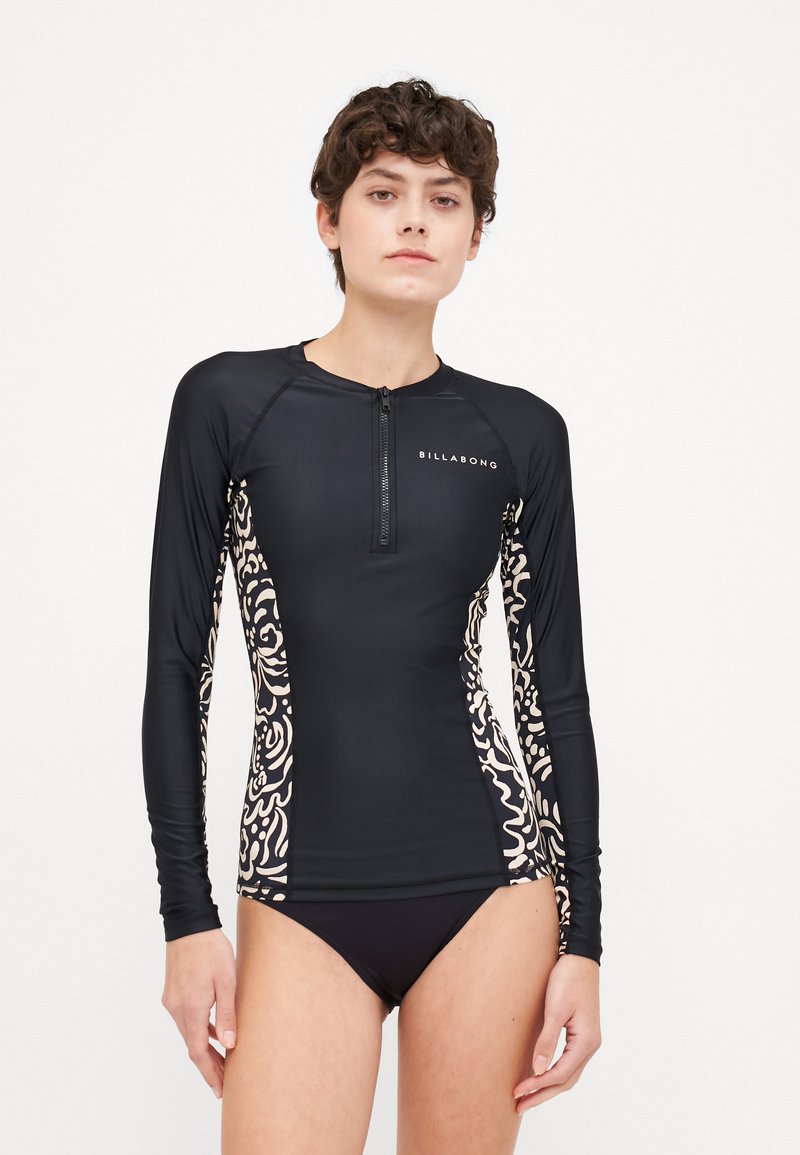 Long-sleeve black rash guard with a front zip, featuring a decorative white pattern on the sides, made of swimwear fabric.