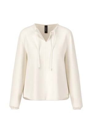 Lightweight cream-colored pullover with a v-neck, drawstring closure, long sleeves, and gathered cuffs. Smooth texture, relaxed fit.