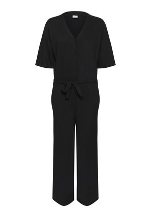 Mustat haalarit, joissa on lyhyet hihat, V-pääntie, etupainikkeet, sidottava vyötärö ja leveät lahkeet. Valmistettu teksturoidusta kankaasta.