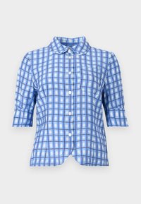 Camicia a quadri blu con maniche a sbuffo corte, chiusura con bottoni, colletto e taschino. Il tessuto ha una leggera consistenza con linee scure in contrasto.