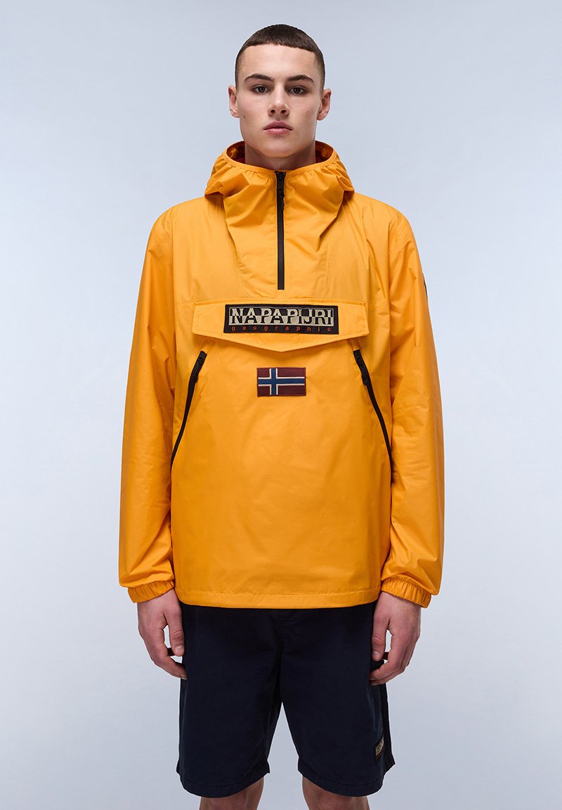 Yellow waterproof jacket with a front pocket, half-zip, and a logo patch. Features a small Norway flag detail and adjustable drawstring hood.