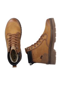 Braune Leder-Mid-Top-Stiefel mit Schnürdesign, strukturiertem Obermaterial, schwarzem Akzent am Knöchel und robuster Gummisohle. Mit Logodetail.