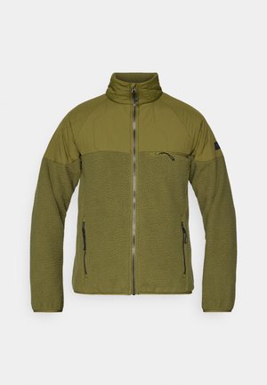 Veste vert olive avec fermeture éclair à l'avant, col haut et corps en polaire texturée. Dotée d'un tissu lisse sur les épaules et les poches poitrine.