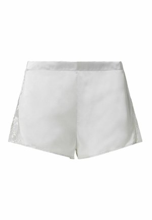Pantaloni corti in satin bianco con pannelli in pizzo sui lati. Tessuto liscio con vestibilità su misura e taglio dritto all'orlo.