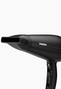 Black BaByliss hair dryer with narrow nozzle attachment and control buttons on the handle against white background.