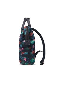 Floral-print backpack featuring a dark fabric base with leaves and flowers in pink, green, and blue. Has a padded strap and top handle.