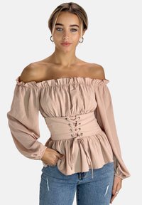 Unselected, rosa