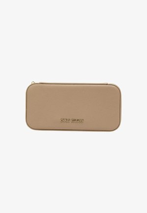 Beige leather zipper pouch with a smooth texture, rounded edges, and gold "CARLO COLUCCI" branding on the front.