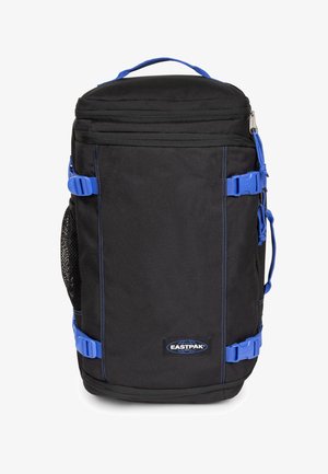 Sort Eastpak-rygsæk med blå remme, top-håndtag, net-sidelomme, frontlynlås og Eastpak-logo påsyet nederst i midten.