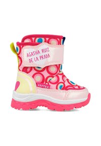 Botín infantil impermeable con una base rosa y círculos multicolores, una correa de velcro blanca y una suela de goma texturizada.