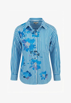 Camicia a maniche lunghe con righe verticali blu e bianche, decorata con motivi floreali blu e argento e una tasca sul petto, con bottoni sul davanti.