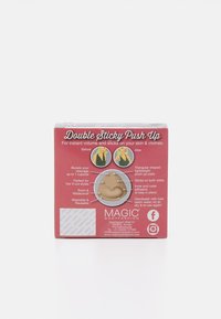 Packaging for double sticky push-up pads in a rectangular red box. Features instructional graphics and branding with a simple design.