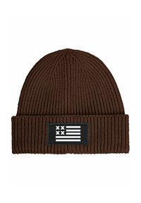 Brown knitted beanie with a ribbed texture. Features a black patch displaying a flag design with white stripes and symbols.