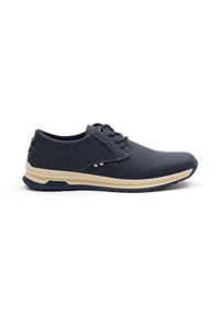 Zapato de cuero azul marino con punta redondeada, diseño de cordones, media suela color crema y acentos texturizados cerca del talón. Suela de goma para agarre.