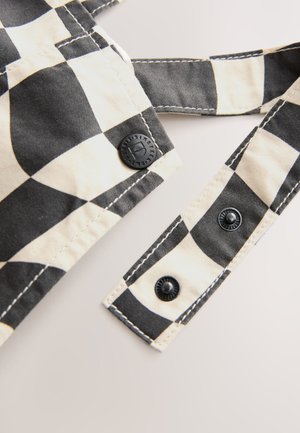 Next REGULAR FIT - Kombinezonas su petnešomis - black ecru checkerboard