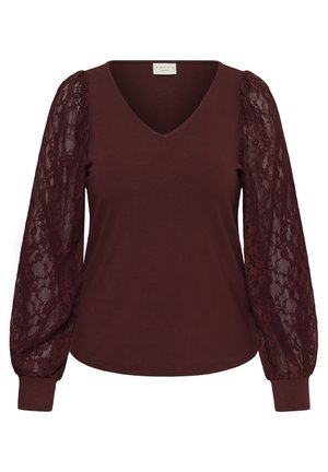 Haut bordeaux à manches longues avec col en V, corps en tissu uni et manches bouffantes en dentelle transparente avec poignets ajustés.