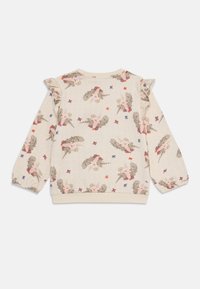 Vaalee beige sweatshirt, jossa on leikkisä yksisarvinen ja kukkakuosi, röyhelöillä olkasuissa ja elastisilla hihansuilla.