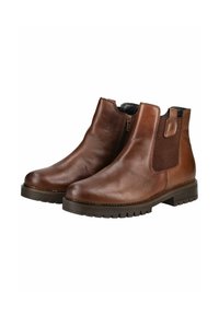 Bottines en cuir marron avec une finition lisse, panneaux élastiques sur les côtés et une semelle épaisse. Elles possèdent un bout arrondi et une couture décorative.