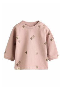 Rosa Baumwoll-T-Shirt mit kurzen Ärmeln, das mit mehreren kleinen grünen Kaktusdesigns verziert ist. Es verfügt über Druckknöpfe an der Schulter für ein einfaches Anziehen.