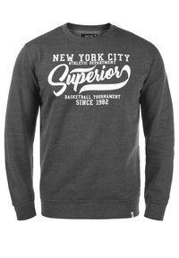 Gray sweatshirt with long sleeves, round neck, featuring white text: "NEW YORK CITY ATHLETIC DEPARTMENT," "SUPERIOR," and "SINCE 1982."