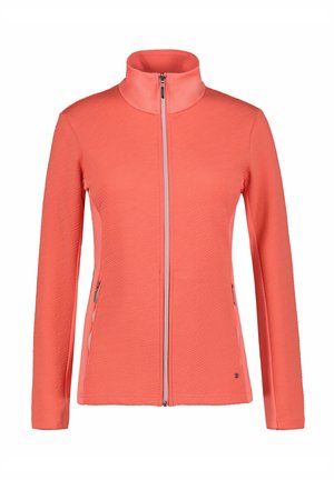 Korallfärgad jacka med strukturerad tyg, hel dragkedja, hög krage och två sidofickor med dragkedja. Mjuk, stretchig material.