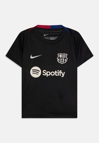 Black Nike football jersey with short sleeves. Features a white Spotify logo and a Barcelona crest. Collar has red and blue accents.