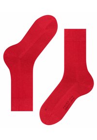 Rote Baumwollsocken mit nahtlosem Zeh, gerippten Bündchen und einer glatten Textur. Mit einem bedruckten Logo an der Sohle.