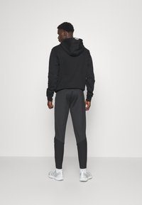 Venum UFC FIGHT NIGHT ADRENALINE JOGGERS - Træningsbukser - blue