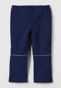 Navy blue pants in a synthetic material with an elastic waistband, featuring white reflective stripes along the knee area.