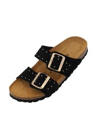 Sandali con tacco in suede nero, con due cinghie regolabili, fibbie argentate, accenti di borchie e un plantare in sughero su una suola nera testurizzata.