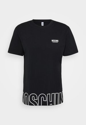 T-shirt nera in cotone con maniche corte, scollo rotondo e il logo "Moschino" in bianco sul petto e sull'orlo.