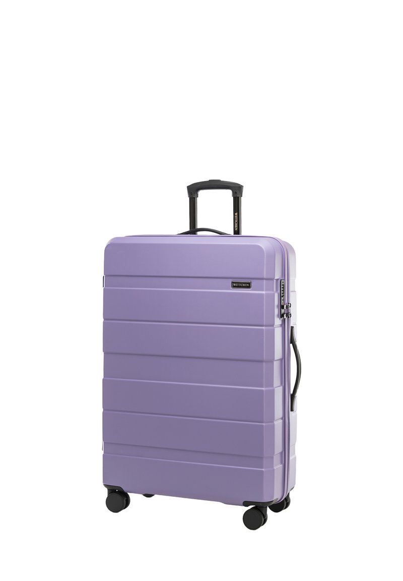 Valigia rigida di colore viola chiaro. Presenta righe orizzontali, una maniglia telescopica, quattro ruote e una maniglia laterale per un facile trasporto.