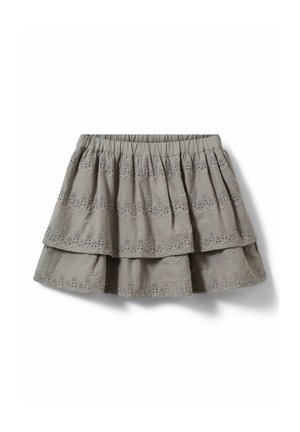 Harmaa kerroksittain leikattu hame, jossa kuminauhavyötärö ja pitsimäinen reunus kerrosten kohdalla. Valmistettu kevyestä ja pehmeäpintaisesta kankaasta.