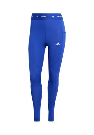 Blue full-length athletic leggings with logos on waistband and thigh, featuring side pockets and contour seams.