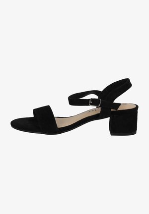 Schwarze Wildleder-Absatzsandalen mit einem Knöchelriemen und quadratischer Zehenpartie. Sie verfügen über einen Blockabsatz und eine glatte Innenauskleidung. Minimalistisches Design.