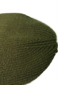 Olive green knitted hat with a smooth, textured finish. The design features a rounded shape and subtle stitch detailing throughout.