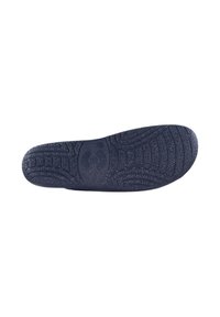 Suela de zapato de goma negra con un patrón texturizado que presenta ranuras y crestas para mayor tracción. Diseño de punta redondeada y talón curvado.